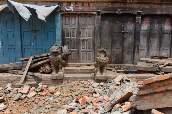 Closed shops and the damaged entrance of a house in Bhaktapur, Nepal.